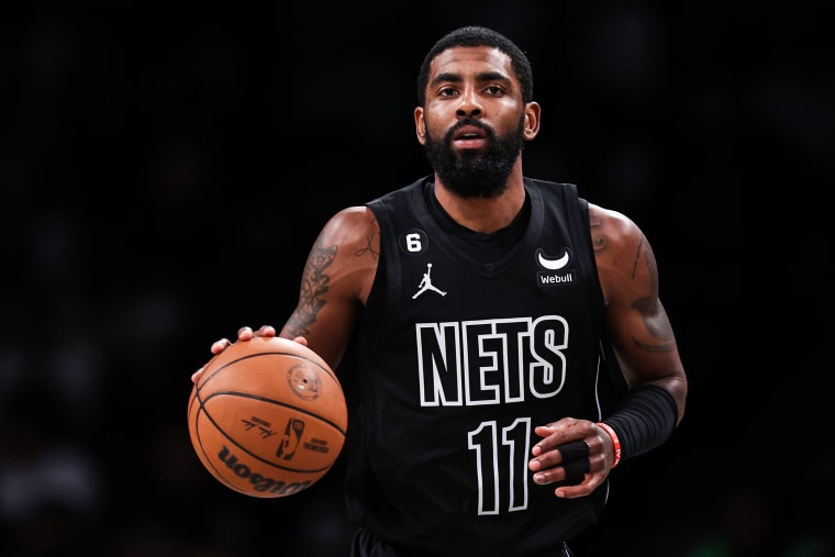 Kyrie Irving of the Brooklyn Nets brings the ball up the court during the first quarter of the game against the Indiana Pacers on Oct. 31, 2022, in New York.