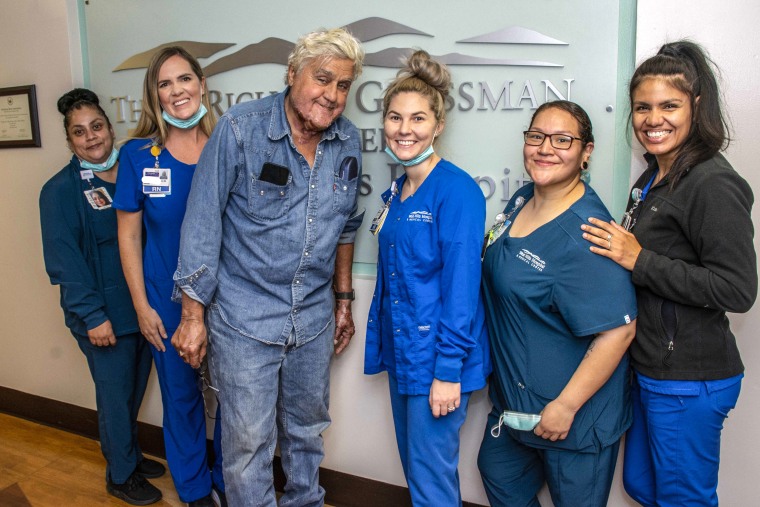 Photo shows Jay Leno as he leaves hospital after being burned in garage