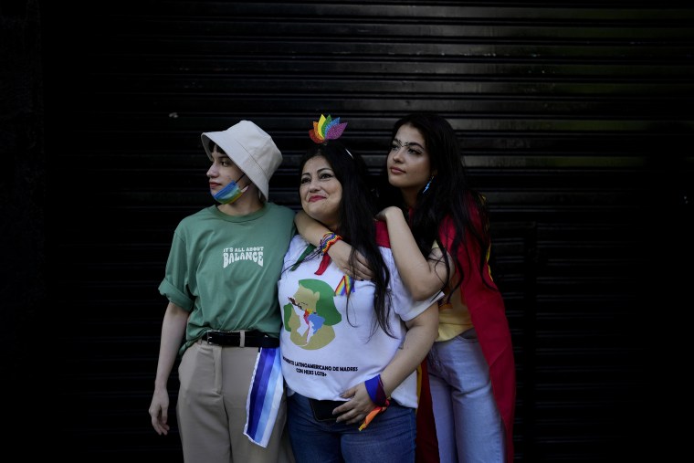 Claudia Delfín of Bolivia with her trans son Zan, and her bisexual daughter Celeste, in Buenos Aires.