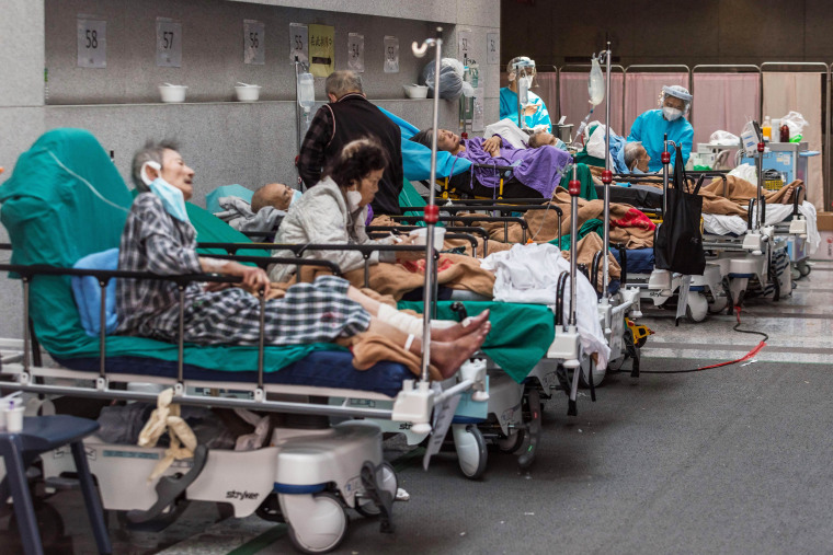 Patients held in an area of Princess Margaret hospital in Hong Kong on March 11, 2022 as the city experienced overflowing hospitals and morgues, shortages of medics and ambulances.