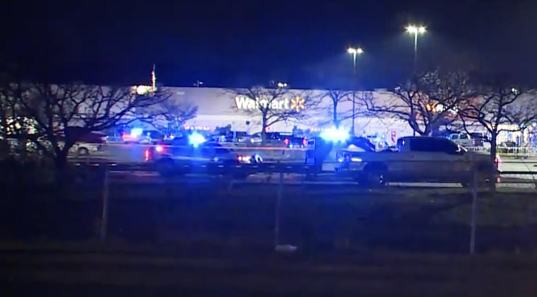 Law enforcement investigate a shooting at a Walmart in Chesapeake, Va., on Tuesday.