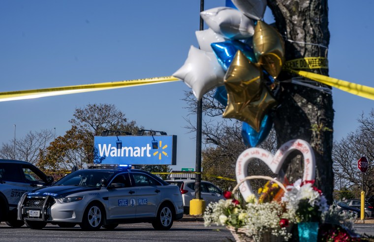 Image: A makeshift memorial outside of a Walmart where six people were fatally shot on Nov. 23, 2022.