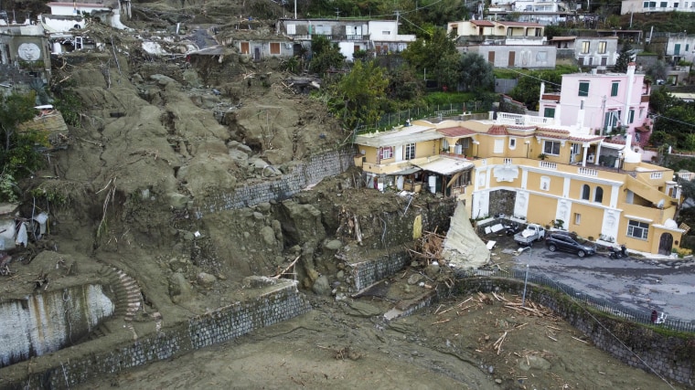 Damaged houses after heavy rainfall triggered landslides that collapsed buildings and left as many as 12 people missing in Casamicciola, on the southern Italian island of Ischia, on Nov. 27, 2022.