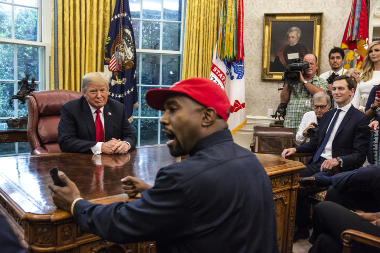 Then-President Donald Trump meets with rapper Kanye West in the Oval Office of the White House on Oct. 11, 2018.
