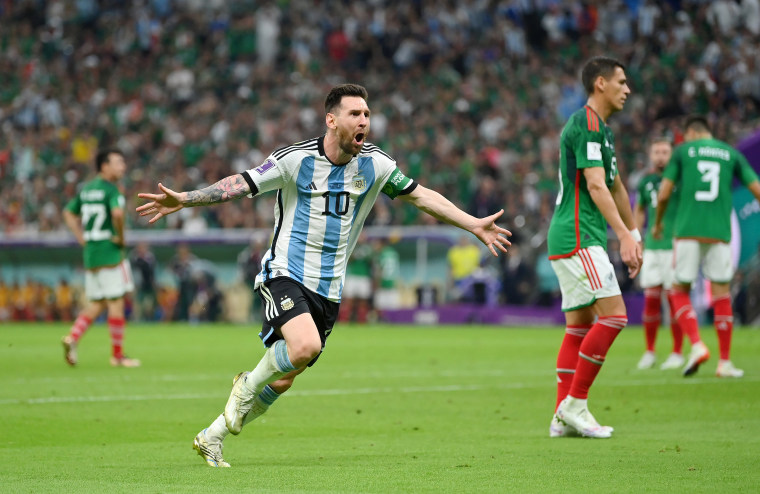 Lionel Messi of Argentina celebrates scoring their team's first goal during a World Cup match against Mexico