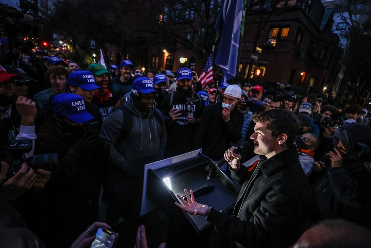 Nick Fuentes speaks as America First protesters are gathered in front of the Gracie Mansion to protest vaccination mandates in New York City on Nov. 13, 2021. 