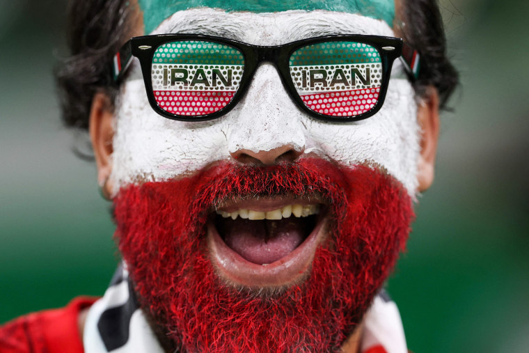 An Iran fan celebrates prior to the World Cup match against the USA in Doha on Nov. 29, 2022.