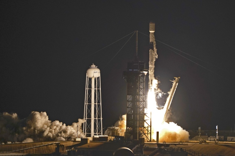 A SpaceX Falcon 9 rocket takes off from the Kennedy Space Center in Cape Canaveral, Florida on Dec. 9, 2021, carrying NASA's X-ray Imaging Polarimetry Explorer (IXPE) spacecraft.