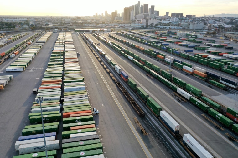 Shipping containers and rail cars sit in a Union Pacific Intermodal Terminal rail yard