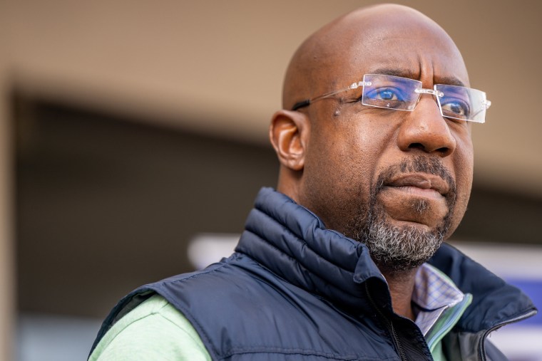 Sen. Raphael Warnock speaks during a campaign rally