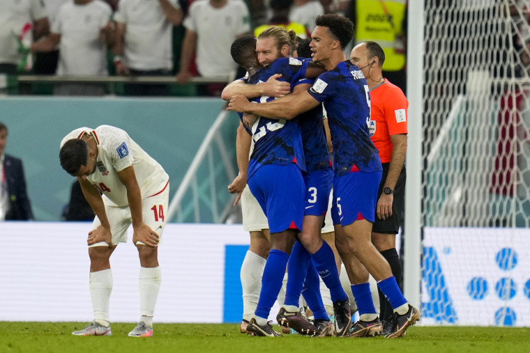 U.S. players celebrate after winning their World Cup match against Iran in Doha on Nov. 30, 2022..