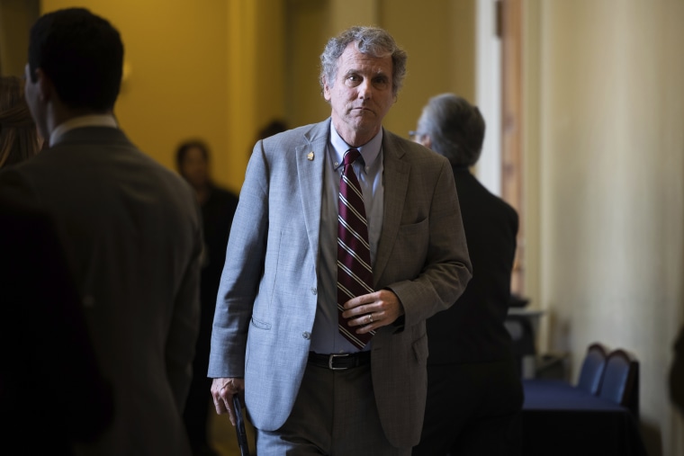 Sherrod Brown departs a Senate Democratic Caucus policy luncheon at the U.S. Capitol.