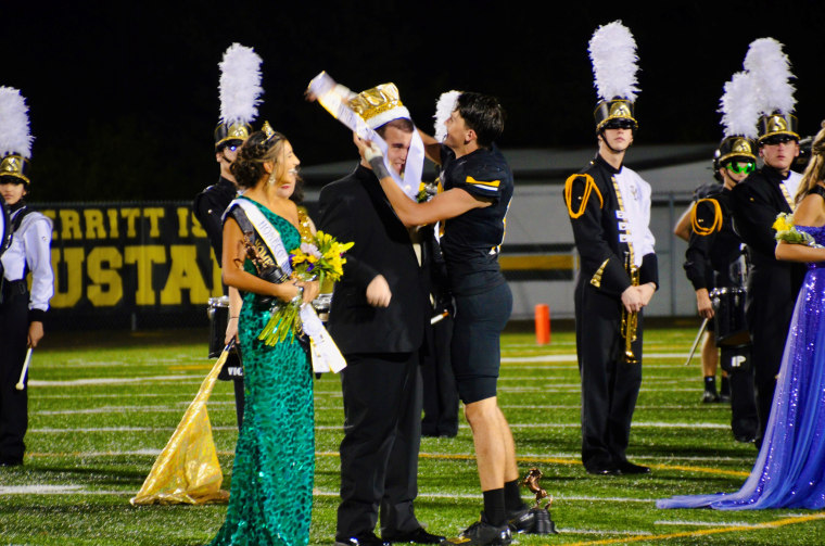 James Verpaele handed his sash and crown over to Parks Finney.