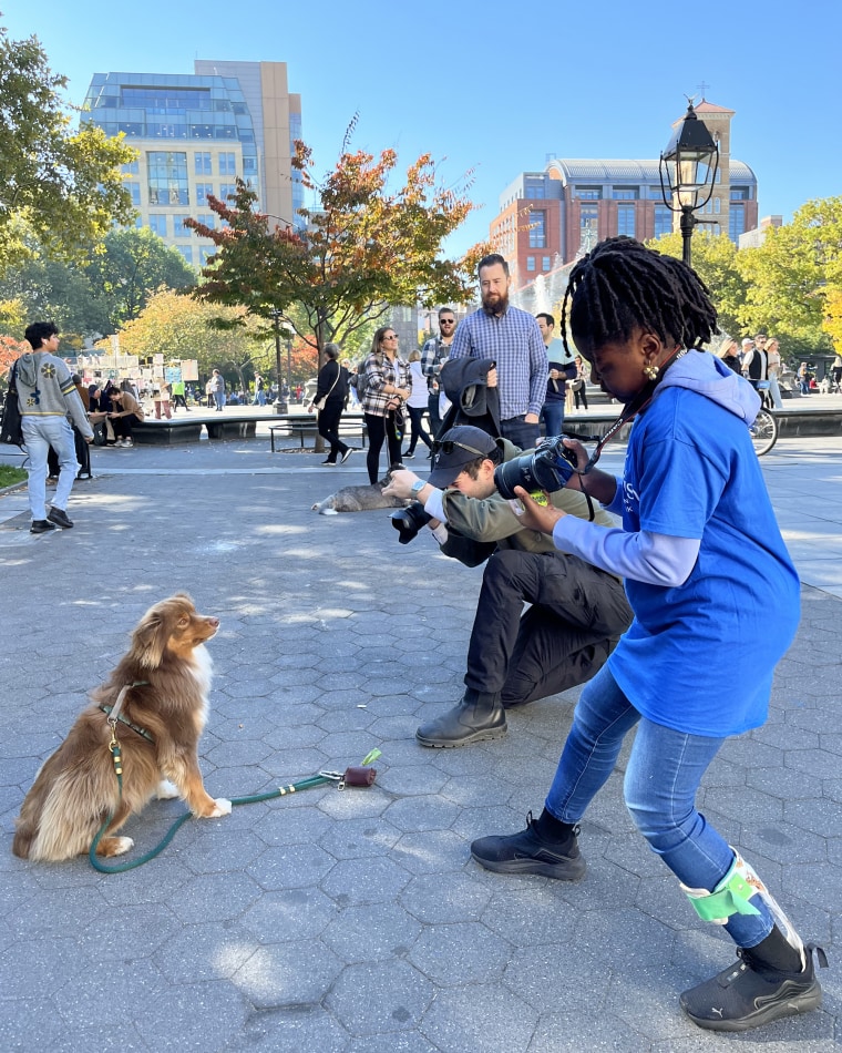 Elias Weiss Friedman, aka The Dogist, said Zoey Henry is a natural when it comes to photographing dogs. Here they are with Roo.