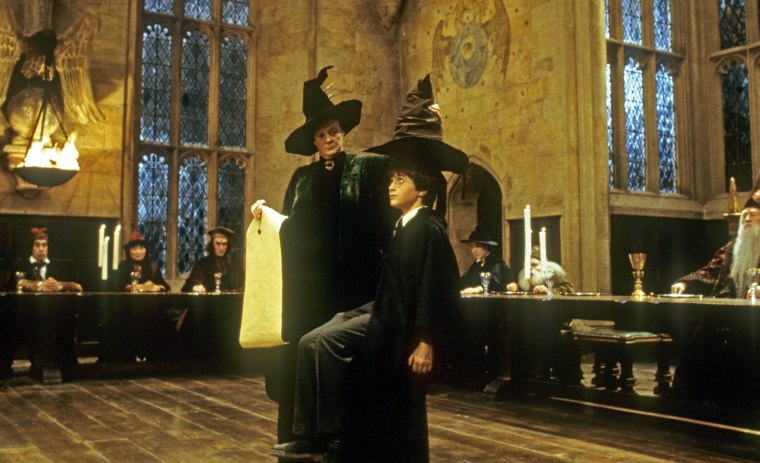 Maggie Smith and Daniel Radcliffe with the sorting hat