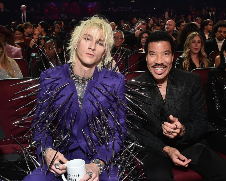 Machine Gun Kelly and Lionel Richie at The American Music Awards.