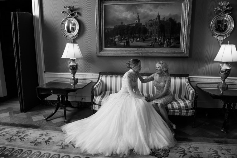 Naomi Biden in her Ralph Lauren wedding dress and First Lady Jill Biden in Reem Acra. Photographed at the White House by Norman Jean Roy, Vogue, Winter 2022.