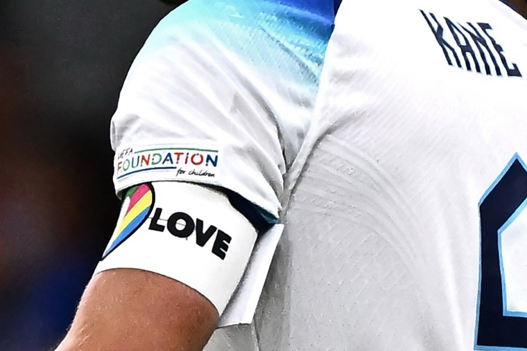 England's forward Harry Kane wearing a rainbow armband at the San Siro Stadium in Milan on Sept. 24, 2022. The "OneLove" armband was going to be worn by the likes of Kane and his German counterpart, Manuel Neuer, as part of a campaign to promote inclusivity.