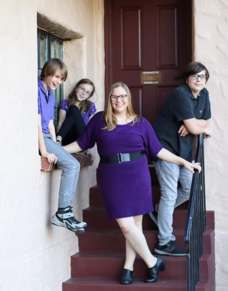 Emily Taylor, pictured with her three children. 