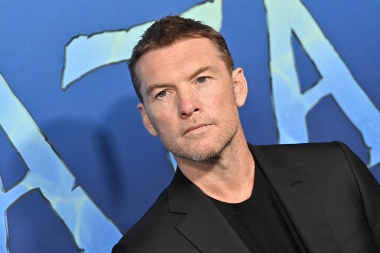 Sam Worthington attends 20th Century Studio's "Avatar 2: The Way of Water" U.S. premiere on Dec. 12, 2022 in Hollywood, Calif.