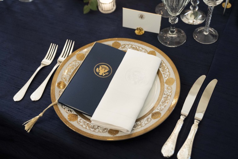 A table is set up during a media preview of the State Dinner with President Joe Biden and French President Emmanuel Macron in the State Dining Room of the White House in Washington, Wednesday, November 30, 2022.
