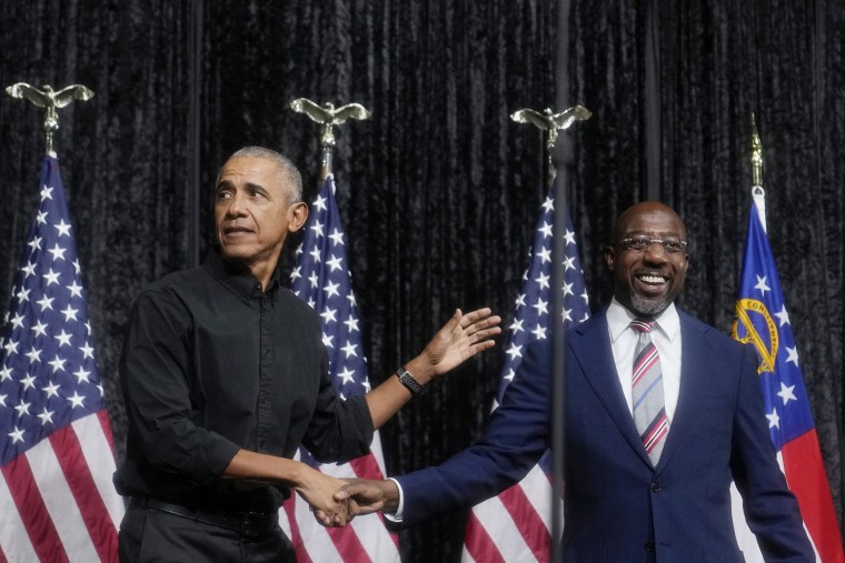 Former President Barack Obama, and Sen. Raphael Warnock at a rally yesterday in Atlanta. 