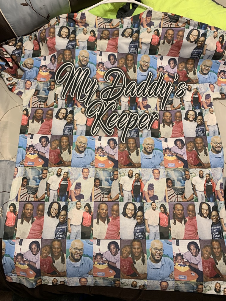 A shirt decorated with pictures of Kevin Johnson and his daughter, Khorry Ramey.