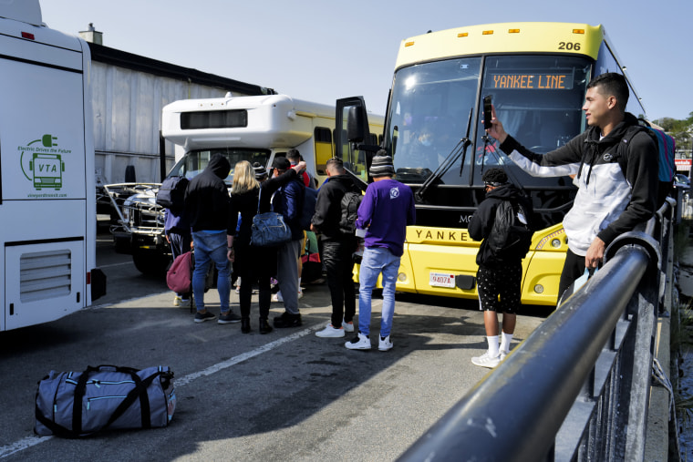 Venezuelan migrants gather at the Vineyard Haven ferry terminal 