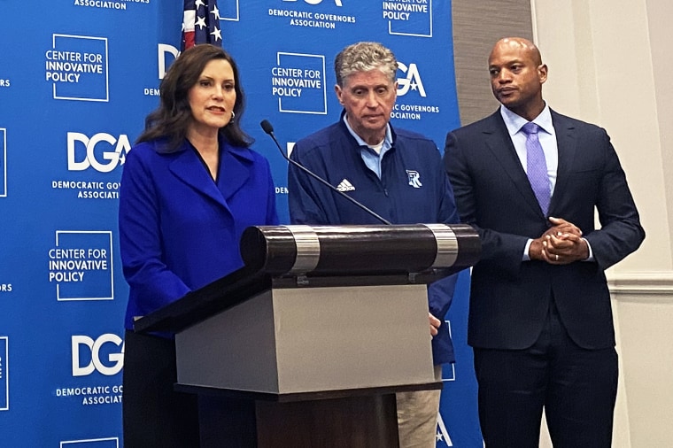 From left, Michigan Gov. Gretchen Whitmer speaks as Rhode Island Gov. Dan McKee and Maryland Governor-elect Wes Moore listen in New Orleans, on Friday.