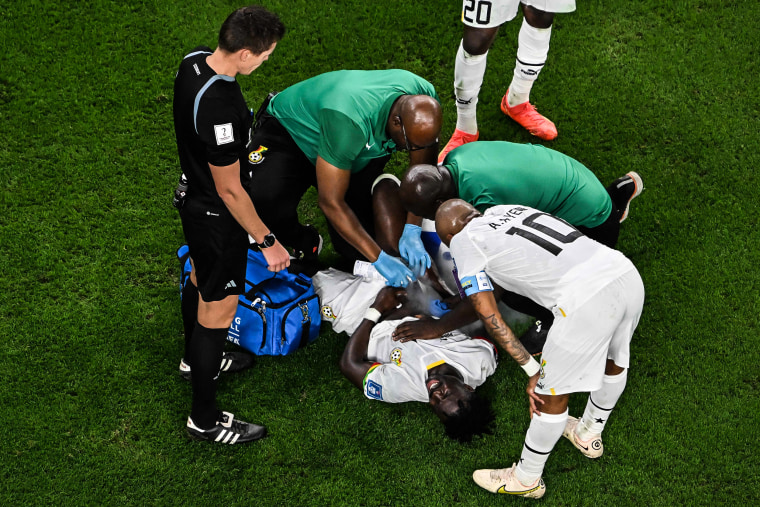 Image: Ghana's defender #26 Alidu Seidu (C) receives medical attention during the Qatar 2022 World Cup Group H football match between Ghana and Uruguay at the Al-Janoub Stadium in Al-Wakrah, south of Doha on Dec. 2, 2022.