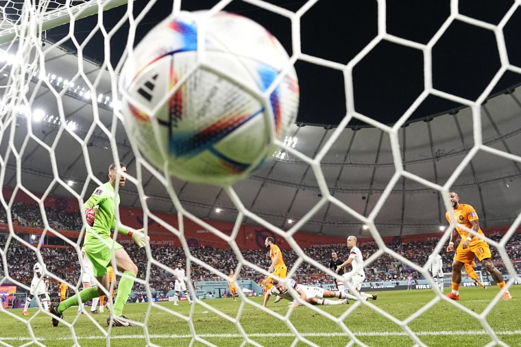 Daley Blind of the Netherlands, scores during the World Cup