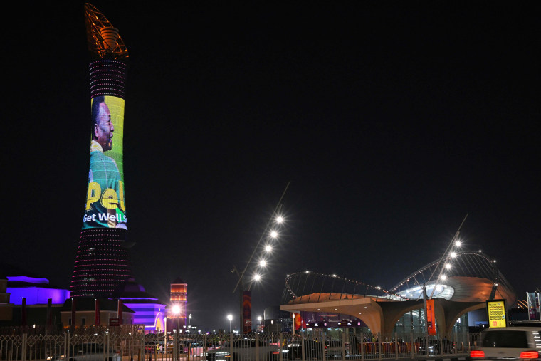 The Torch Tower of Doha displays a picture of Pelé with a "get well soon" message during the World Cup