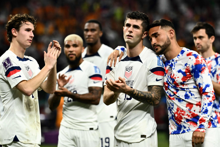 United States players react at the end of the World Cup match 