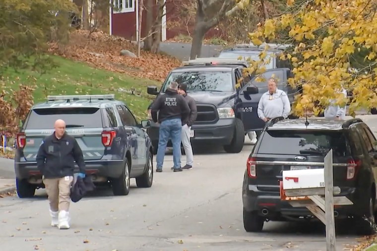 Police respond to the scene of two killings in Marshfield, Mass., on Nov. 30, 2022.