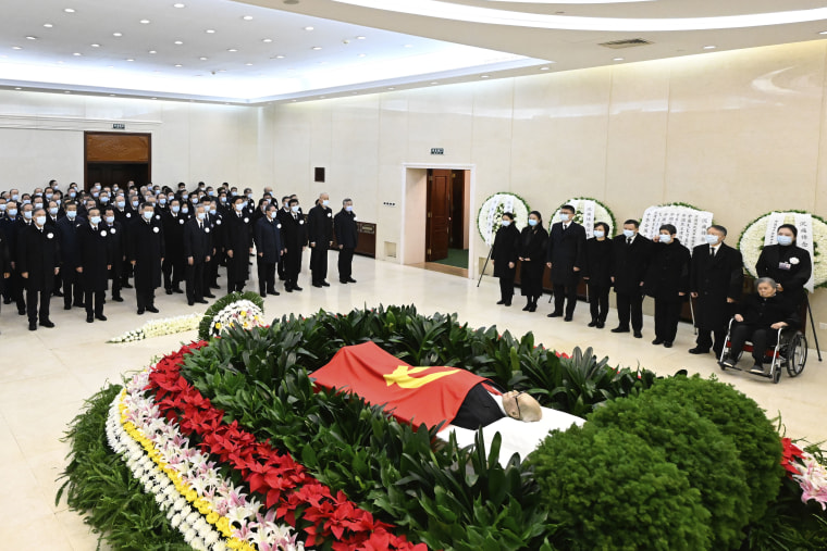 Officials pay their last respects to Jiang in Beijing on Monday.