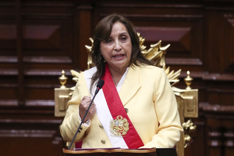 Former Vice President Dina Boluarte addresses lawmakers after being sworn-in as the new president in Lima, Peru, on Dec. 7, 2022.