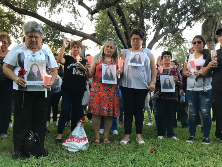 Dozens of family members and friends of four women who authorities say were killed by a U.S. Border Patrol agent gather for a vigil in Laredo, Texas, on Sept. 18, 2018. 