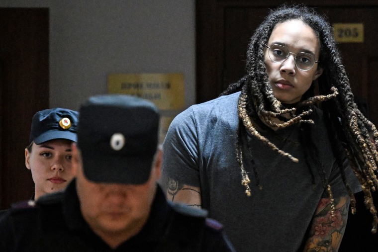 Brittney Griner is escorted to the courtroom in Khimki, outside Moscow, on Aug. 4, 2022.