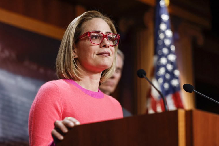 Image: Sen. Kyrsten Sinema, D-Ariz., speaks at a news conference at the Capitol on Nov. 29, 2022.