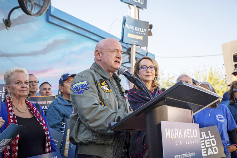 Sen. Mark Kelly speaks to supporters at the Barrio Cafe in Phoenix