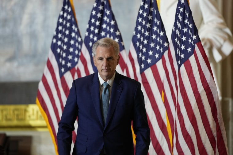 House Minority Leader Kevin McCarthy leaves the Capitol Rotunda