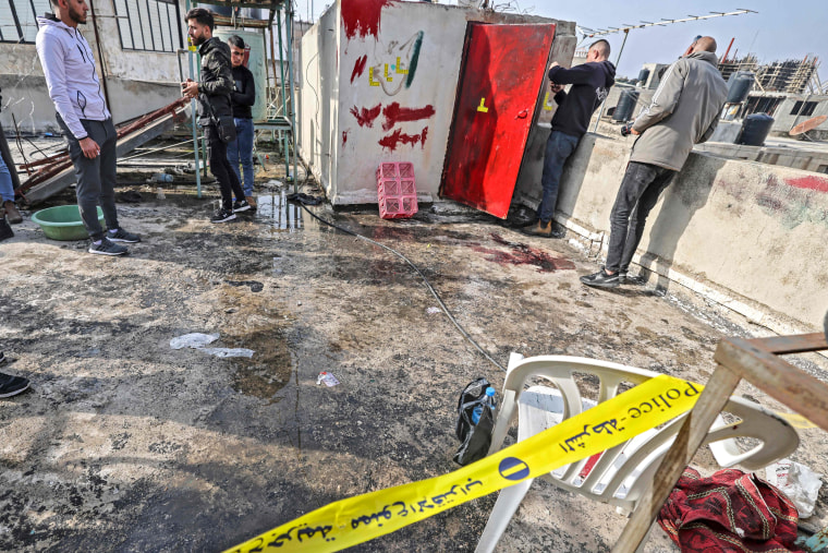 Image: Palestinians inspect the area where a teenage girl was killed during an Israeli raid in Jenin city in the occupied West Bank, on Dec. 12, 2022.