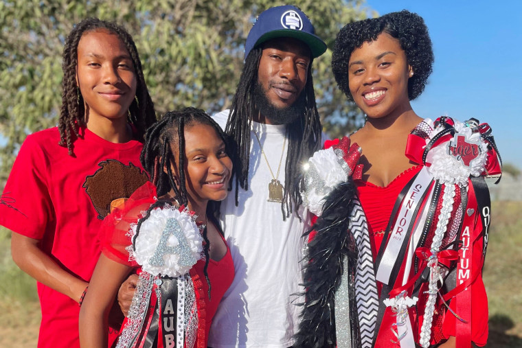 Autumn, right, with her father, Broderick Manahan, and younger siblings Triston, left, and Aubriel.