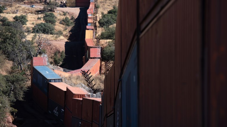 Image: Shipping containers line the U.S. and Mexico Border at Coronado National Memorial in Cochise County, Arizona.