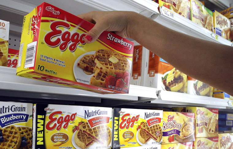A store employee stocks boxes of Eggo frozen waffles in Tallahassee, Fla.