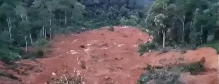 The scene of a landslide at a campsite in Malaysia.
