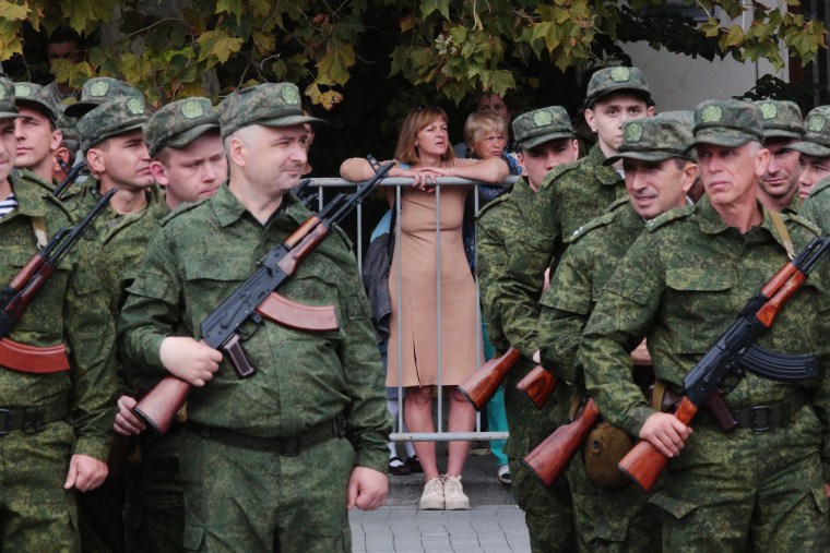 Drafted reservists attend a departure ceremony in Sevastopol, Crimea, on Sept. 27, 2022.