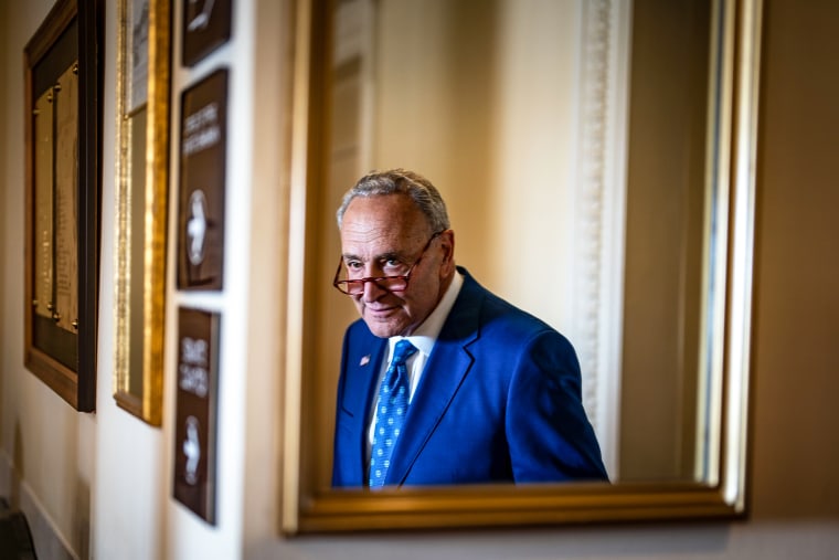 Senate Majority Leader Chuck Schumer, D-N.Y., departs a news conference at the U.S. Capitol on Sunday, Aug. 7, 2022.