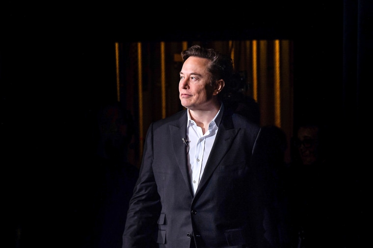 Tesla Inc. Chief Executive Officer Elon Musk walks onto stage at the U.S. Air Force Academy, during the Ira C. Eaker Distinguished Speaker Presentation in the Academy's Arnold Hall on April 7, 2022 in Colorado Springs, Colo.