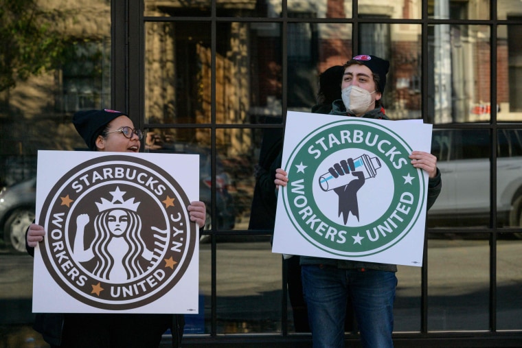 Starbucks workers strike outside a Starbucks coffee shop in Brooklyn